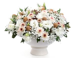 Emanuel Flower Arrangement in shades of white, walnuts. comes in shadow bowl.
