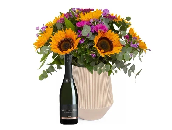 A warm bouquet of a sunflowers & Cava bottle