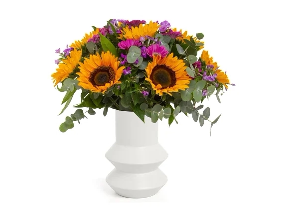 sunflowers in ceramics white vase