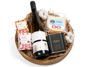 Box with white wine, olive oil, cheese, chocolate
