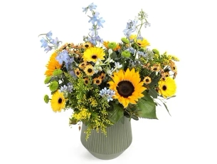 Bouquet of 'Hoshen' sunflowers combined with blue and green branches
