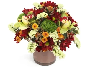 'Purple' flower arrangement in shades of red, orange, brown and green