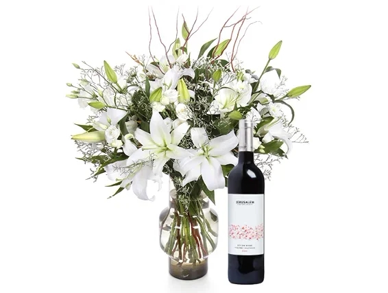 Ornate white holiday bouquet & red wine