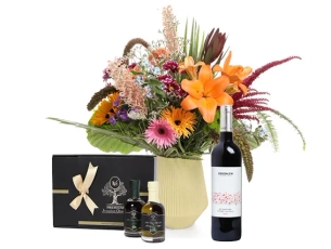a colorful bouquet, red wine & a Gift set of boutique olive oil