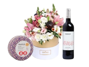 white & pink flowers in a box + red wine & dark chocolate
