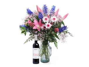 Dar Bouquet in shades of pink and blue. comes with red wine