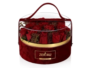 red roses flower in a round velvet box