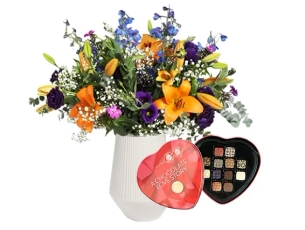 A gorgeous orange bouquet and purple touches plus Max Brenner Chocolate