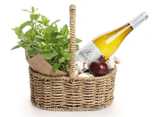 Box with white wine & chocolate & plant & black pomegranate and for decoration