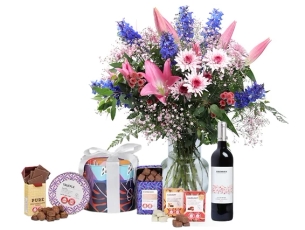 Dar Bouquet in shades of pink and blue comes with Cocoa Senses Chocolate by Max Brenner and red wine